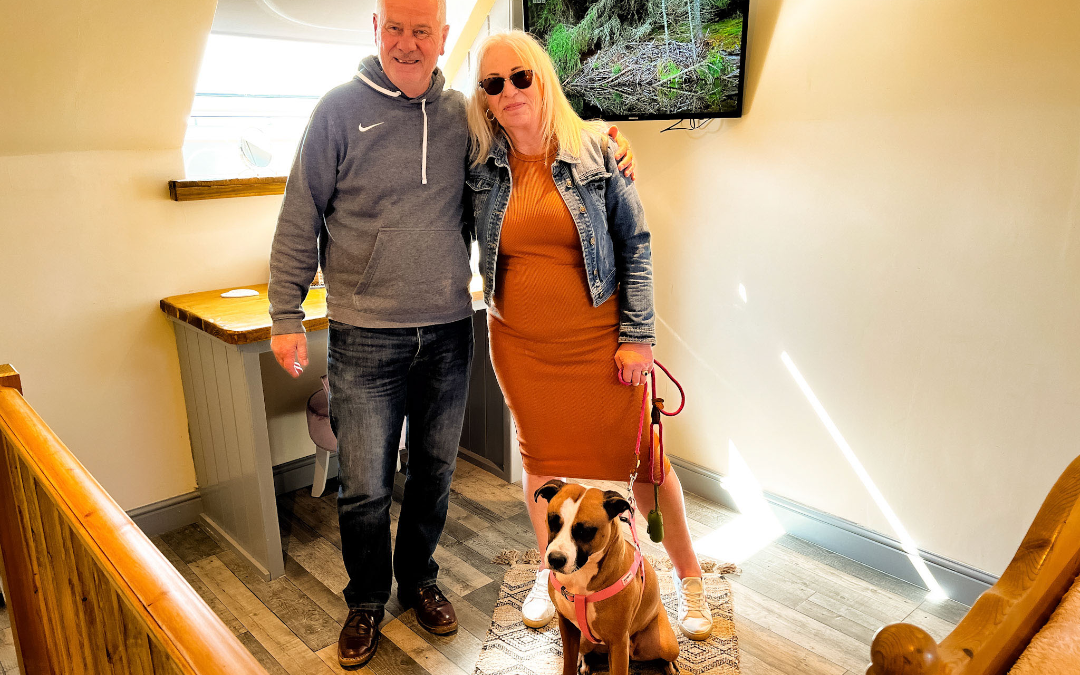 mYminiBreak, Norfolk Accommodation, happy guests with their dog in the hayloft