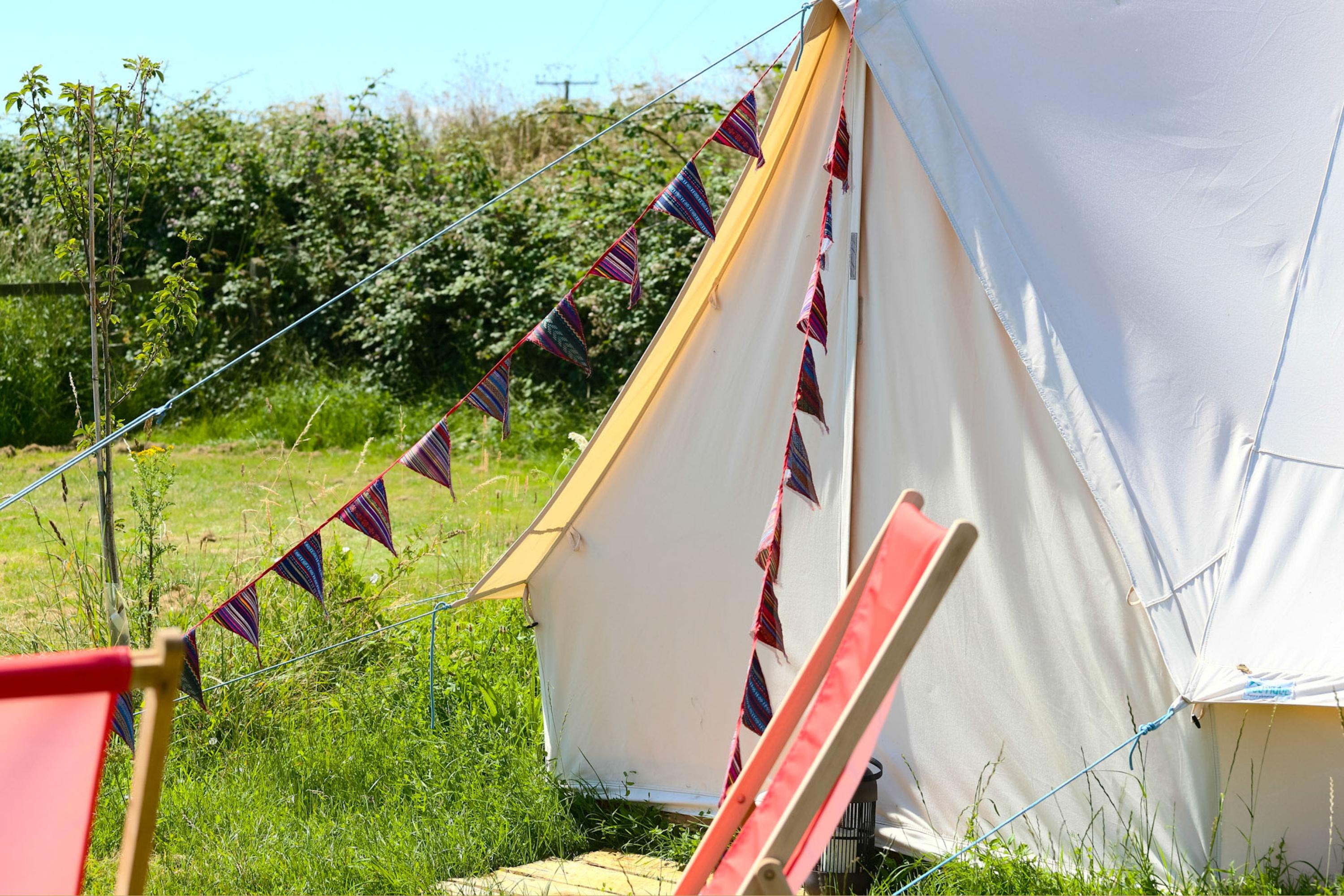 west of wells camping & glamping glamping bell tents in sunny meadow
