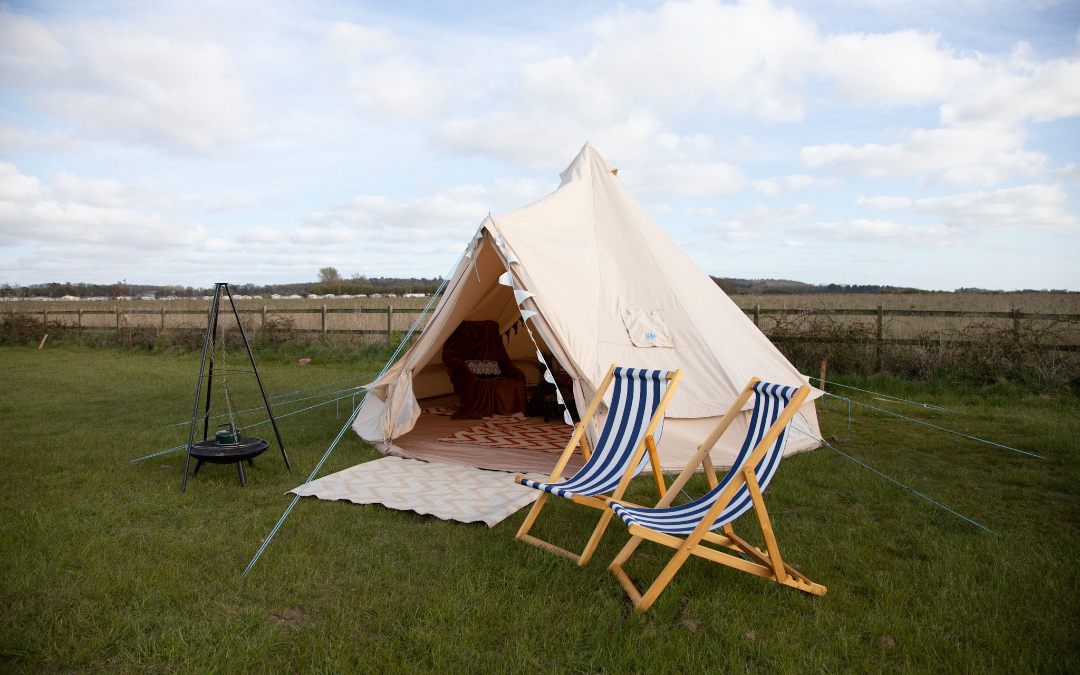 mYminiBreak, Hunstanton Glamping, bell tent with outside seating to enjoy the rural views