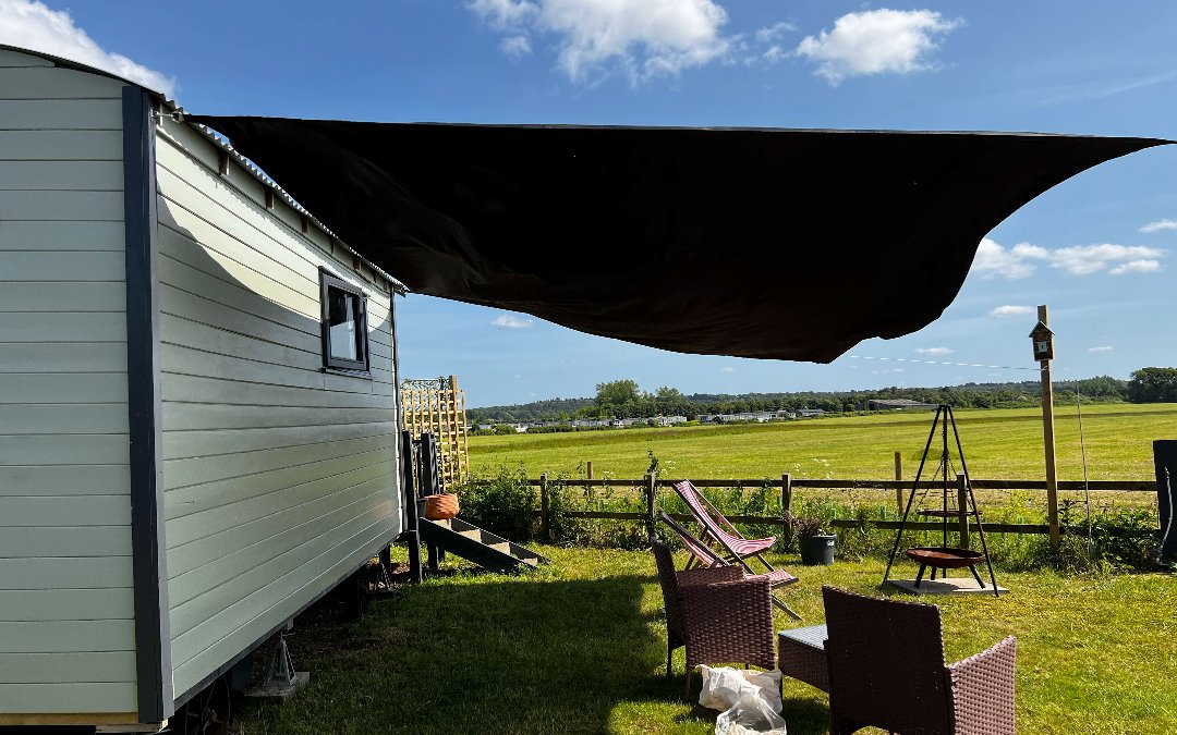 Shepards Hut in Norfolk with a guest and their dog