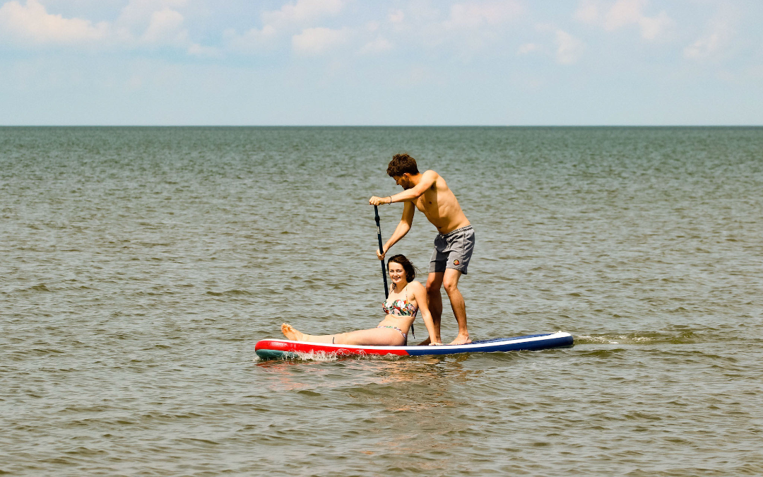 mYminiBreak, our calm seas in the wash are perfect for paddle boarding with your friends and family