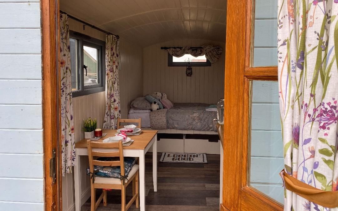 Our Glamping Shepherds Huts have stunning views out over the Norfolk Countryside