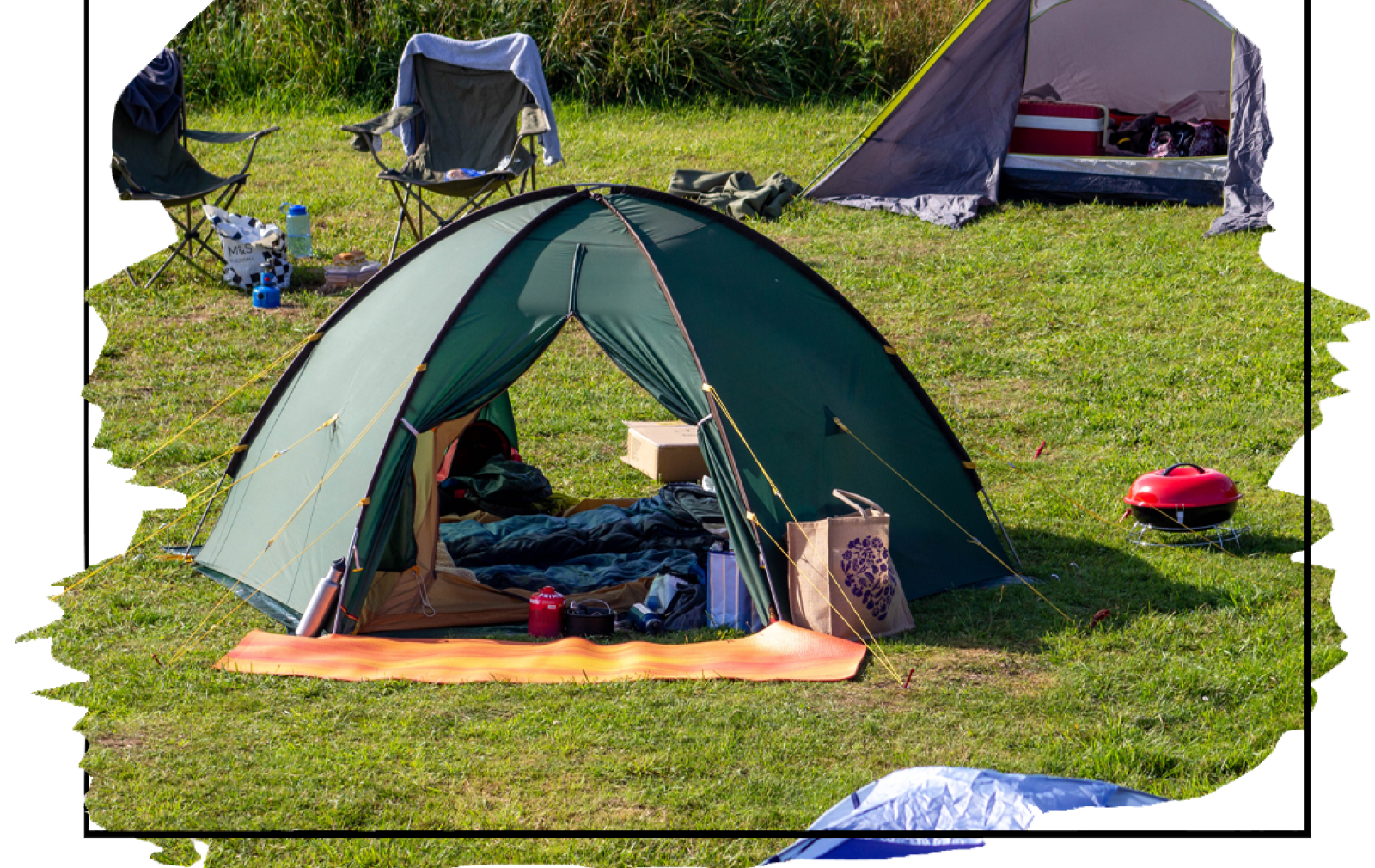 An empty hikers' tent pitched on our site next to the Norfolk Coast Path