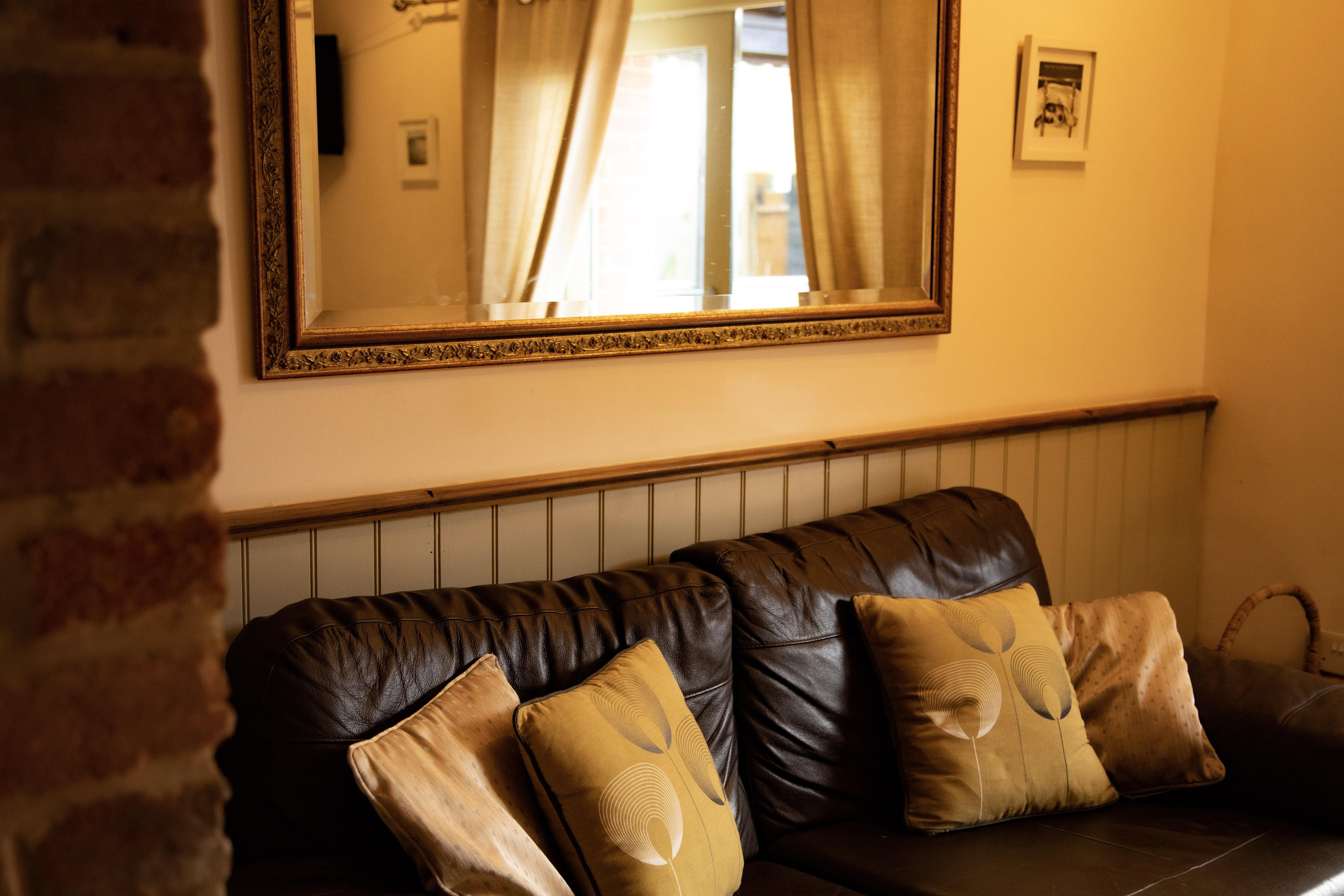 warmly lit sofa in a cottage